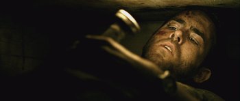 Movie still from “Buried” (2010), directed by Rodrigo Cortés – A man's face looking up at the ceiling; Close Up shot, Overhead angle