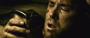 Movie still from “Buried” (2010), directed by Rodrigo Cortés – A person with his eyes closed; Close Up shot, Low angle