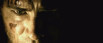 Movie still from “Buried” (2010), directed by Rodrigo Cortés – View of the face of a person; Extreme Close Up shot, Low angle