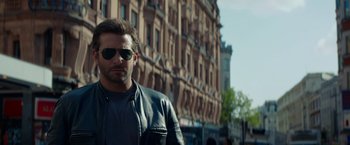 Movie still from “Burnt” (2015), directed by John Wells – A person wearing sunglasses and a leather jacket; Close Up shot, Low angle