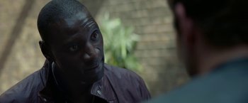 Movie still from “Burnt” (2015), directed by John Wells – A person looking at a camera; Close Up shot, Over the shoulder angle