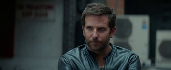 Movie still from “Burnt” (2015), directed by John Wells – A person wearing a leather jacket; Close Up shot, Over the shoulder angle