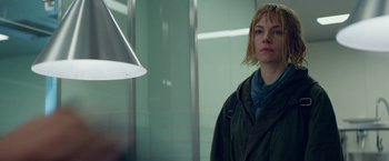 Movie still from “Burnt” (2015), directed by John Wells – A woman standing in front of a mirror in a bathroom; Close Up shot, Low angle