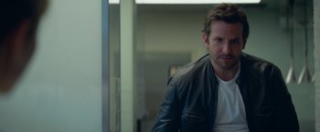 Movie still from “Burnt” (2015), directed by John Wells – A person wearing a leather jacket; Close Up shot, Over the shoulder angle