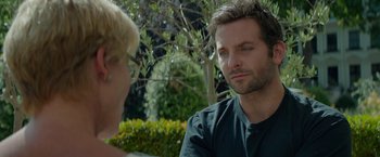 Movie still from “Burnt” (2015), directed by John Wells – A man and a woman sitting in front of each other; Close Up shot, Over the shoulder angle