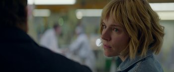 Movie still from “Burnt” (2015), directed by John Wells – A person looking at the camera; Close Up shot, Over the shoulder angle