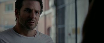 Movie still from “Burnt” (2015), directed by John Wells – A person wearing a white shirt; Close Up shot, Over the shoulder angle