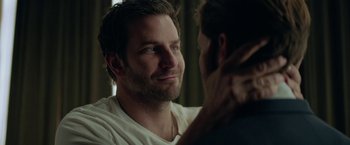 Movie still from “Burnt” (2015), directed by John Wells – A person looking at a person; Close Up shot, Over the shoulder angle