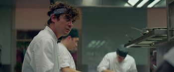 Movie still from “Burnt” (2015), directed by John Wells – A group of men in a kitchen preparing food; Close Up shot, Low angle