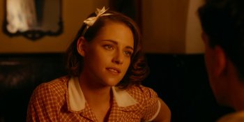 Movie still from “Café Society” (2016), directed by Woody Allen – A person wearing a shirt; Close Up shot, Over the shoulder angle