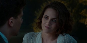 Movie still from “Café Society” (2016), directed by Woody Allen – A person wearing a white shirt; Close Up shot, Over the shoulder angle