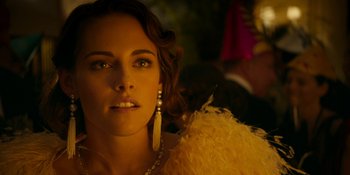 Movie still from “Café Society” (2016), directed by Woody Allen – A person wearing a yellow dress; Close Up shot, Over the shoulder angle