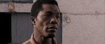 Movie still from “Calvary” (2014), directed by John Michael McDonagh – A person wearing a jacket; Close Up shot, Low angle