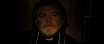 Movie still from “Calvary” (2014), directed by John Michael McDonagh – A person with a beard; Close Up shot, Over the shoulder angle