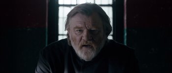 Movie still from “Calvary” (2014), directed by John Michael McDonagh – An old man with a beard and a white mustache; Close Up shot, Low angle