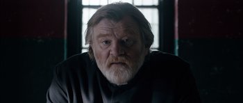 Movie still from “Calvary” (2014), directed by John Michael McDonagh – An old man with a beard and a mustache; Close Up shot, Low angle