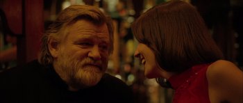 Movie still from “Calvary” (2014), directed by John Michael McDonagh – A man and a woman talking to each other; Close Up shot, Over the shoulder angle
