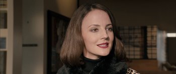 Movie still from “Calvary” (2014), directed by John Michael McDonagh – A person wearing a fur coat; Close Up shot, Over the shoulder angle