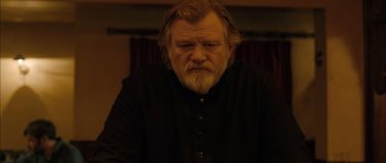 Movie still from “Calvary” (2014), directed by John Michael McDonagh – An older man with a beard and a mustache; Close Up shot, Low angle