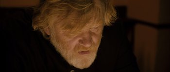 Movie still from “Calvary” (2014), directed by John Michael McDonagh – A person with a beard; Close Up shot, Low angle