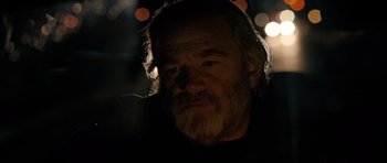 Movie still from “Calvary” (2014), directed by John Michael McDonagh – A person with a beard; Close Up shot, Over the shoulder angle