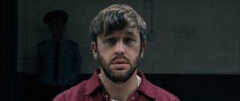 Movie still from “Calvary” (2014), directed by John Michael McDonagh – A person with a beard; Close Up shot, Low angle