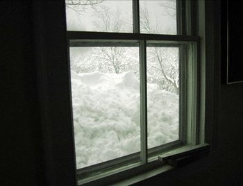 Movie still from “Cameraperson” (2016), directed by Kirsten Johnson – A view from a window of a snow covered field; Wide shot, High angle