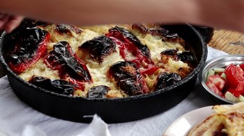 Movie still from “Cameraperson” (2016), directed by Kirsten Johnson – A pan of food that has been cooked in it; Extreme Close Up shot, Overhead angle