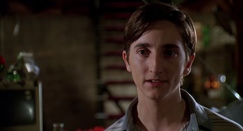 Movie still from “Can't Hardly Wait” (1998), directed by Deborah Kaplan – A young man is looking into the camera; Close Up shot, Low angle
