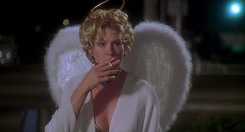 Movie still from “Can't Hardly Wait” (1998), directed by Deborah Kaplan – A woman in a white angel costume smoking a cigarette; Medium shot, Low angle