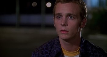 Movie still from “Can't Hardly Wait” (1998), directed by Deborah Kaplan – A young man is looking into the distance; Close Up shot, Low angle