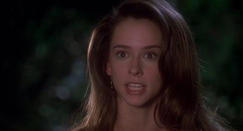 Movie still from “Can't Hardly Wait” (1998), directed by Deborah Kaplan – A person with long brown hair; Close Up shot, Over the shoulder angle