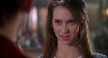 Movie still from “Can't Hardly Wait” (1998), directed by Deborah Kaplan – A person with long brown hair; Close Up shot, Over the shoulder angle
