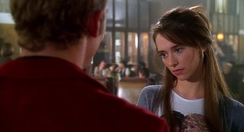 Movie still from “Can't Hardly Wait” (1998), directed by Deborah Kaplan – A man and a woman talking in front of each other; Close Up shot, Over the shoulder angle