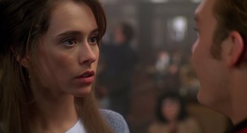 Movie still from “Can't Hardly Wait” (1998), directed by Deborah Kaplan – A person with long brown hair; Close Up shot, Over the shoulder angle