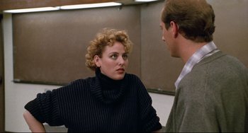 Movie still from “Candyman” (1992), directed by Bernard Rose – A man and a woman talking to each other; Medium shot, Over the shoulder angle