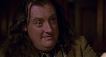 Movie still from “Candyman” (1992), directed by Bernard Rose – A person with long hair; Close Up shot, Low angle