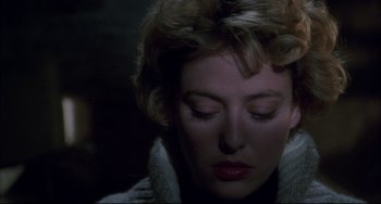 Movie still from “Candyman” (1992), directed by Bernard Rose – A person with her eyes closed; Close Up shot, Low angle
