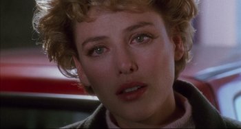 Movie still from “Candyman” (1992), directed by Bernard Rose – A woman's face in a car; Close Up shot, Over the shoulder angle