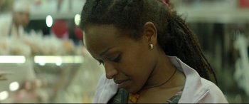 Movie still from “Capernaum” (2018), directed by Nadine Labaki – A person wearing a neckerchief; Close Up shot, Over the shoulder angle