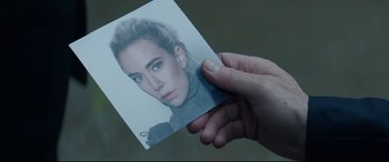 Movie still from “Fast & Furious Presents: Hobbs & Shaw” (2019), directed by David Leitch – A hand holding a picture of a woman; Extreme Close Up shot, Overhead angle