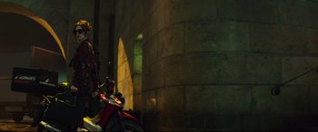 Movie still from “Fast & Furious Presents: Hobbs & Shaw” (2019), directed by David Leitch – A motorcycle parked in front of a brick wall; Wide shot, Low angle