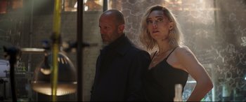Movie still from “Fast & Furious Presents: Hobbs & Shaw” (2019), directed by David Leitch – A man and a woman standing next to each other; Medium shot, Over the shoulder angle