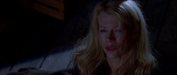 Movie still from “Cellular” (2004), directed by David R. Ellis – A woman with long blonde hair stares into the camera; Close Up shot, Low angle