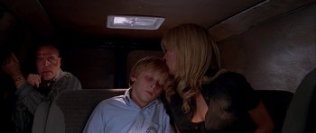 Movie still from “Cellular” (2004), directed by David R. Ellis – A woman and a boy sleeping in the back of a car; Close Up shot, Low angle