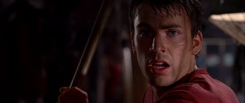 Movie still from “Cellular” (2004), directed by David R. Ellis – A person holding a baseball bat; Close Up shot, Over the shoulder angle