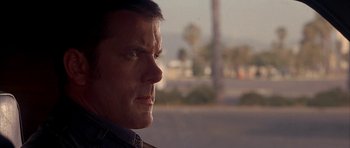 Movie still from “Cellular” (2004), directed by David R. Ellis – A person looking out of a car window; Close Up shot, Low angle