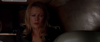 Movie still from “Cellular” (2004), directed by David R. Ellis – A person with long blonde hair; Close Up shot, Low angle