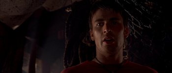 Movie still from “Cellular” (2004), directed by David R. Ellis – A person wearing a red shirt; Close Up shot, Low angle