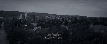 Movie still from “Changeling” (2008), directed by Clint Eastwood – An old photo of the city of los angeles in 1 9 2 8; Extreme Wide shot, High angle